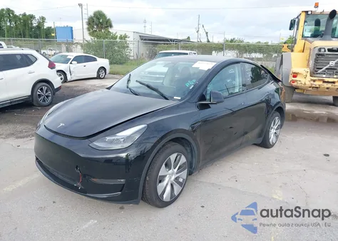 2023 Tesla Model Y Awd/Long Range Dual Motor All-Wheel Drive z USA, uszkodzony, nr VIN 7SAYGDEE2PA044328